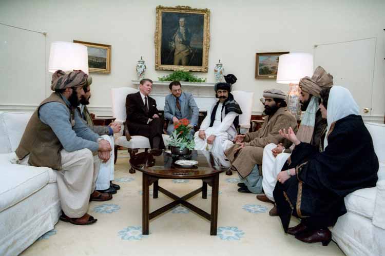1983 - President Ronald Reagan meets with Afghan Mujahideen commanders in the Oval Office (photo credits to anwaribrahimdotcom via Flickr Creative Commons
