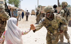 Female soldiers work with women of Afghanistan