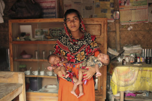 Child marriage and early motherhood is a prevalent problem in Bangladesh. Girls are betrothed to men they have never met from as early as two years old and, thereafter, get pregnant at the onset of menstruation. There are numerous reasons cited for early marriages, including girls being a financial burden to their (already poor) family; younger girls require a lower dowry payment and marrying to prevent girls from being sexually harassed. Afroza is 17 years old and gave birth to twins two months ago. After delivering her first child, she lost consciousness only to wake up to more labour pains and the surprising news of a second baby on the way. You mean at 16 years old, I was carrying two babies in my body? My body is so small, I dont know how I did it. she expressed. Afroza struggles to eat as she has suffered a loss of appetite and has developed a fear of vomiting since giving birth. She struggles as a young mother and has difficulty in breastfeeding her children due to the lack of breast milk. I feel inadequate as a mother. I cannot provide for my babies enough.