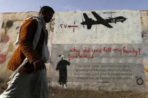A man walks past graffiti denouncing US involvement in Yemen. https://flic.kr/p/MA4RAs