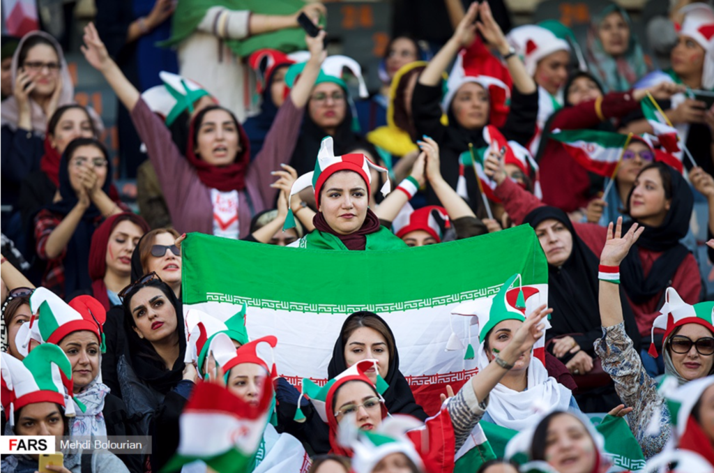 Women attend Iran's World Cup qualifying game against Cambodia after the ban against women in stadiums is lifted for the first time in almost forty years. "Iran vs Cambodia, 10 October 2019 (06)" by Mehdi Bolourian is taken from Fars News Agency and is licensed under CC BY 4.0.