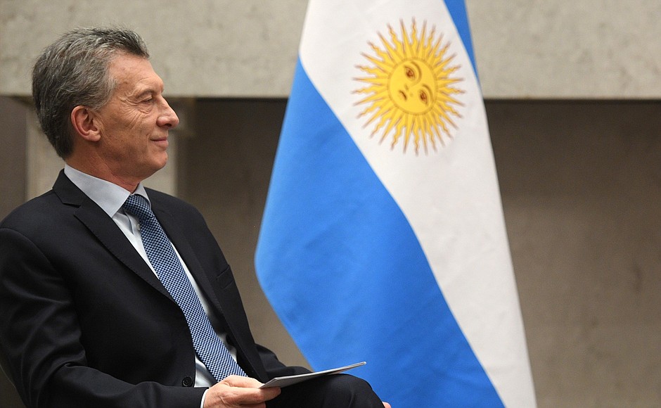 President Mauricio Macri in front of an Argentine flag